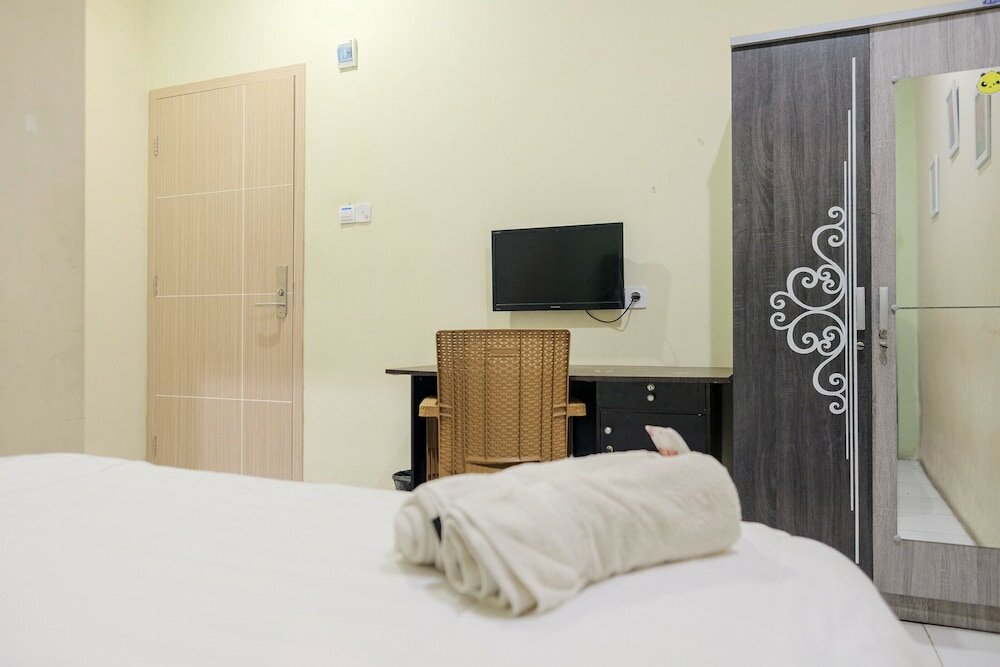 Фото Urbanview Hotel Ta Ke Jelutung Jambi