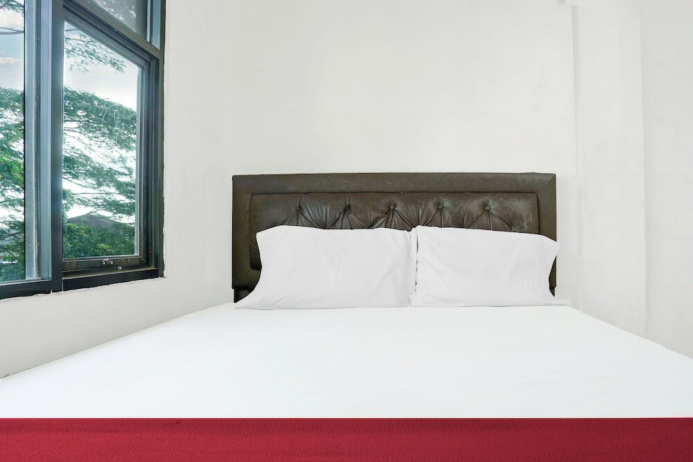 Фото Oyo 92609 Guest House Malay Singkawang