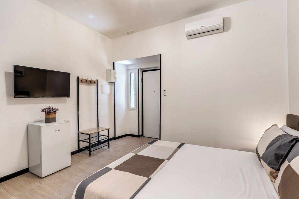 Фото The Quarters Naples Apartment