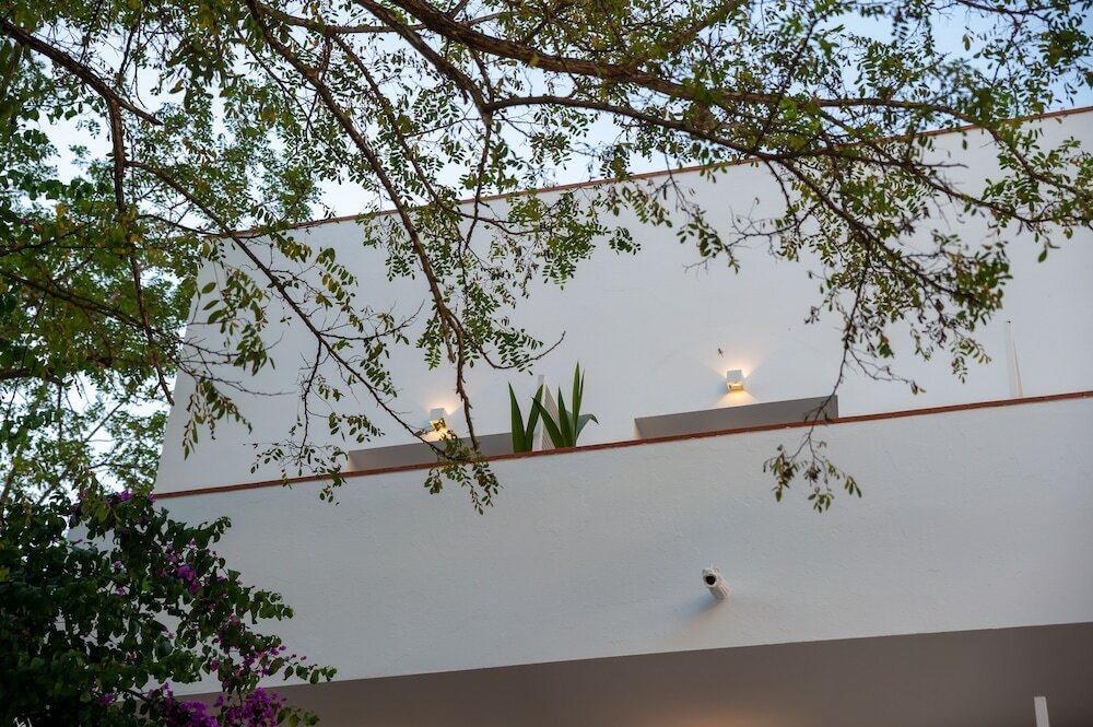 Фото Hostal Es Niu de Tamariu