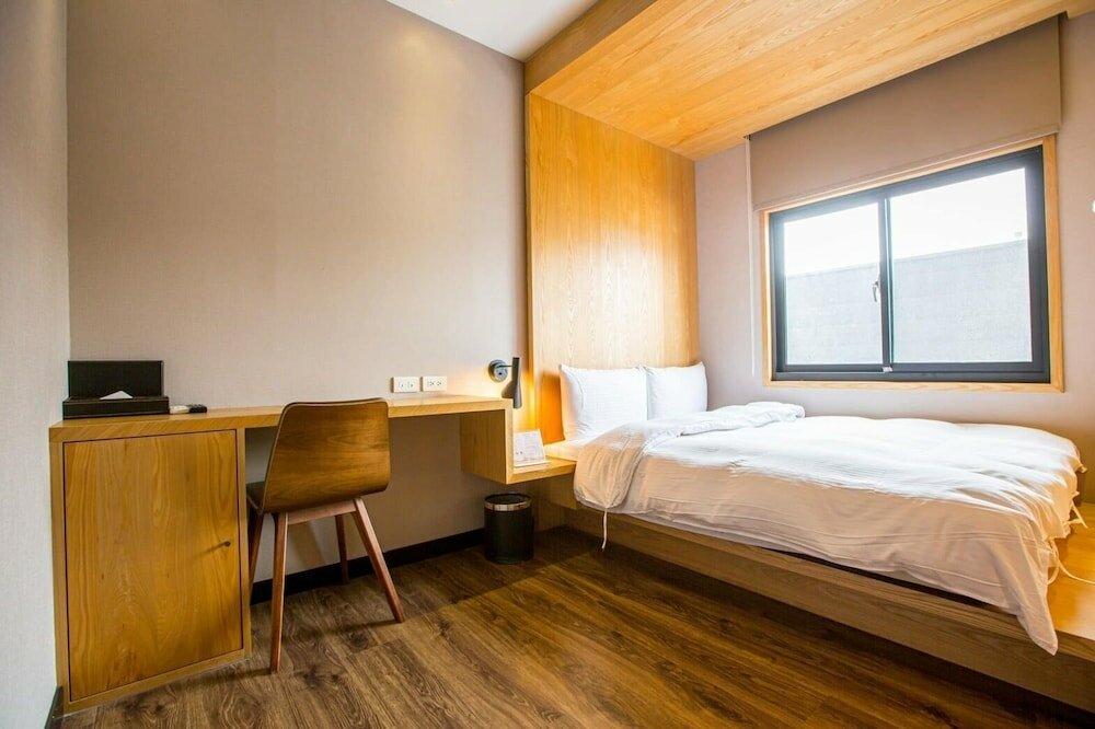 Фото Taichung Easylazy Inn