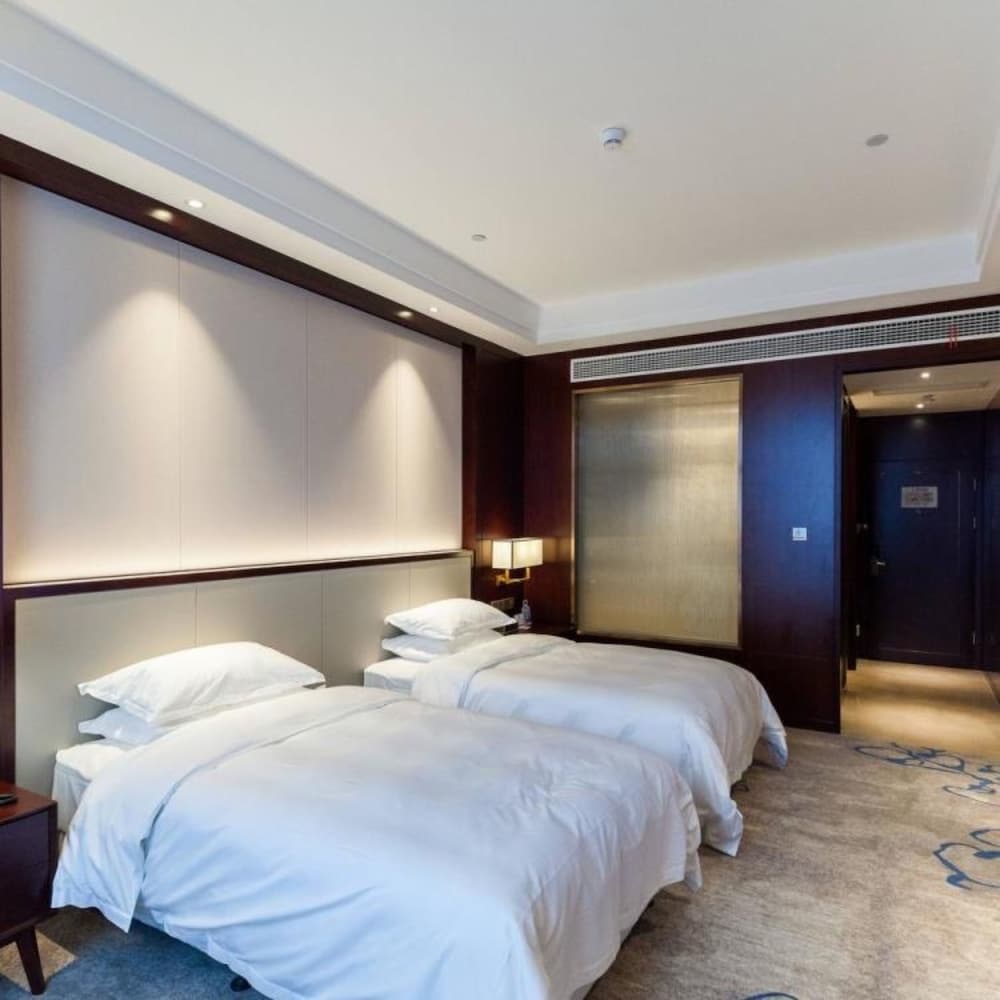 Фото Jinyi Jinglan Hotel