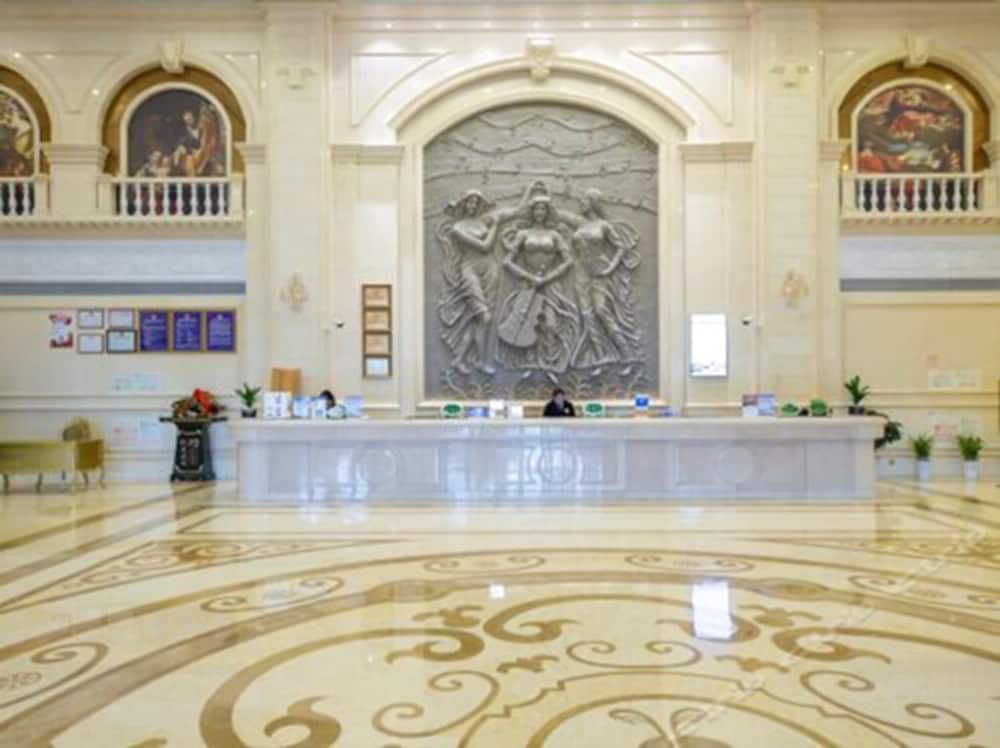 Фото Vienna International Hotel - Ningbo City West Xintiandi