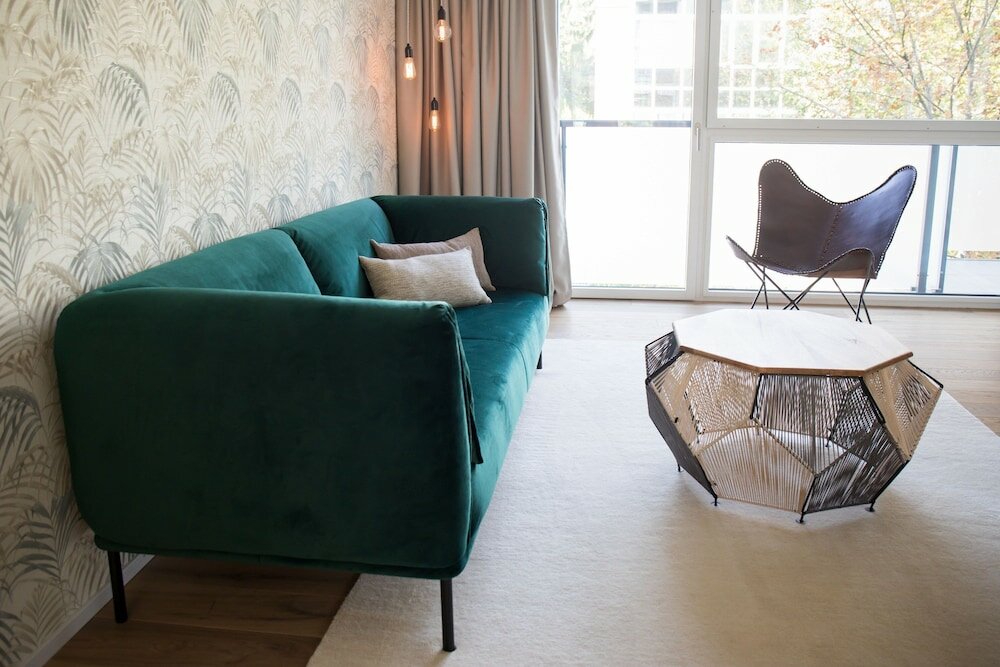 Фото Gubelhof Suites
