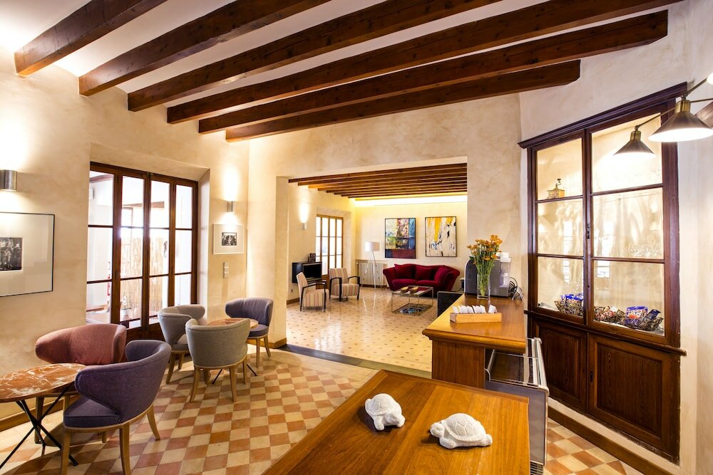 Фото Hotel y Apartamentos Des Puig