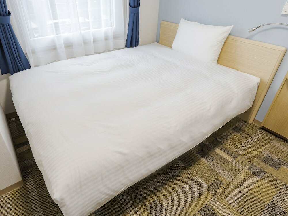 Фото Toyoko Inn Osaka Dome Mae