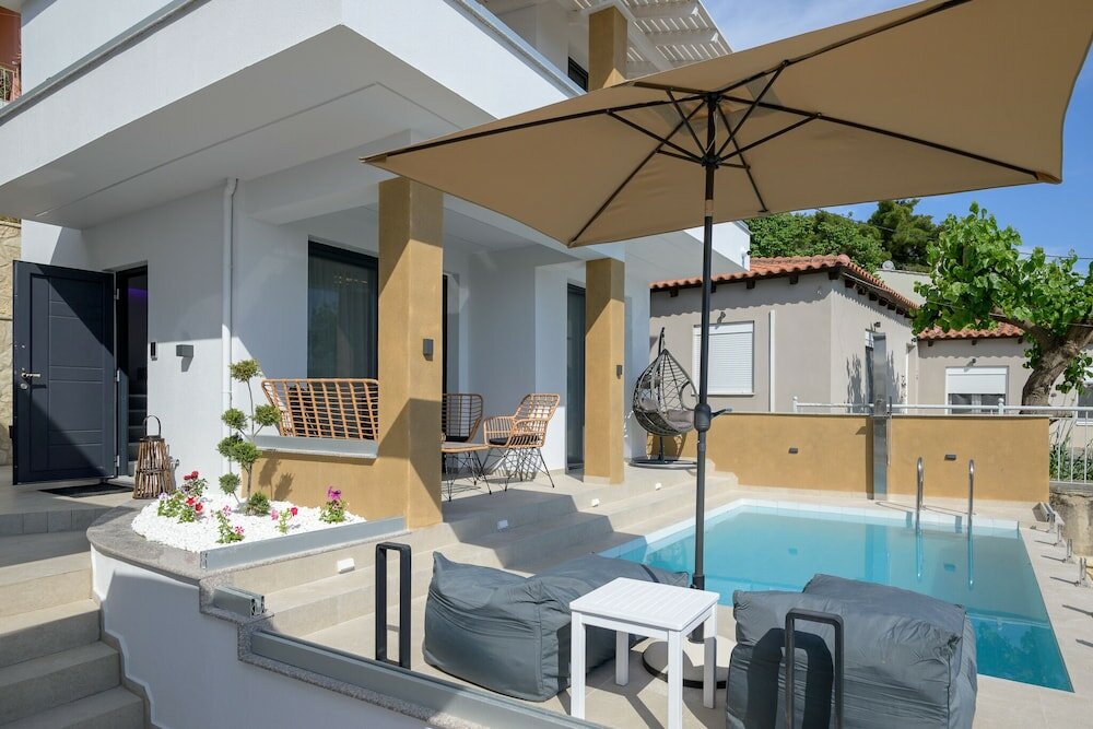 Фото Luxury maisonettes Vrachos with pool