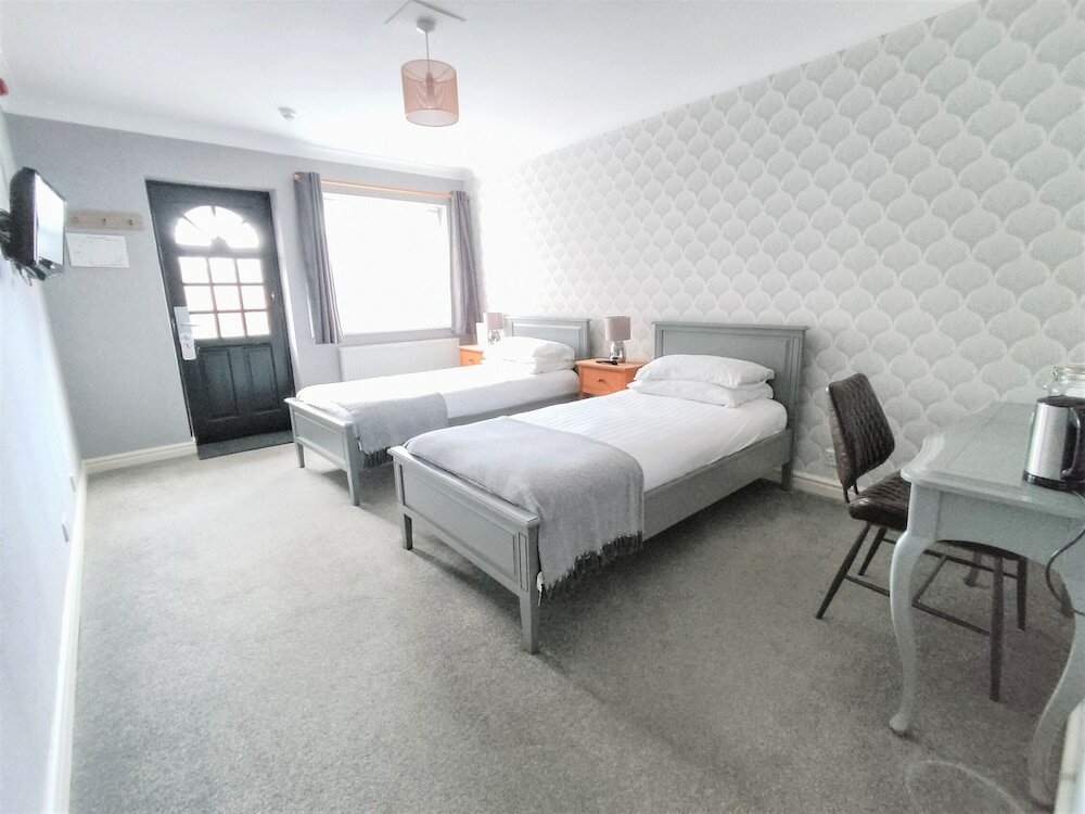 Фото Woodcote Hotel