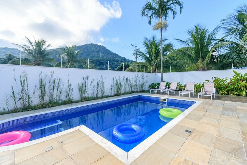 Фото Magnífica Mansão à 50m da praia de Barequeçaba para até 18 pessoas