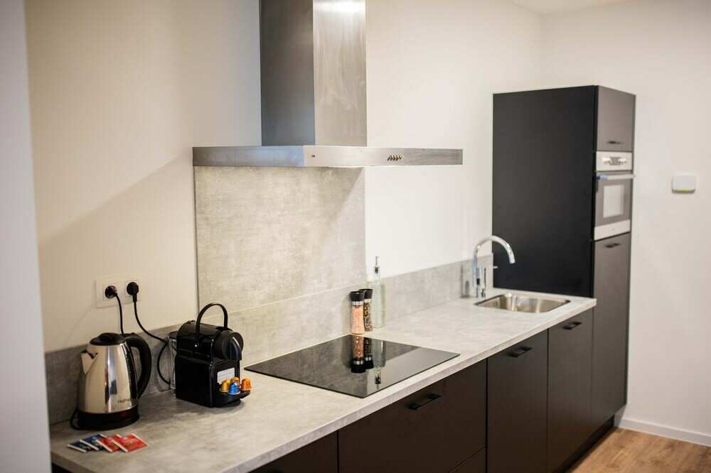 Фото Alphabet Apartments The Hendrik