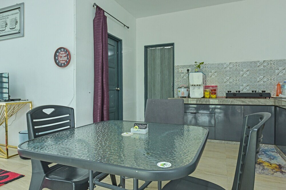 Фото Oyo Home 90682 Liliz Mambang Farmstay