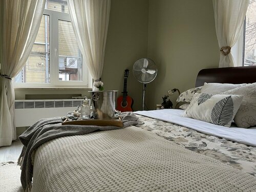 Апартаменты Изысканные апартаменты с 1 спальней и садом в центре города в Риге