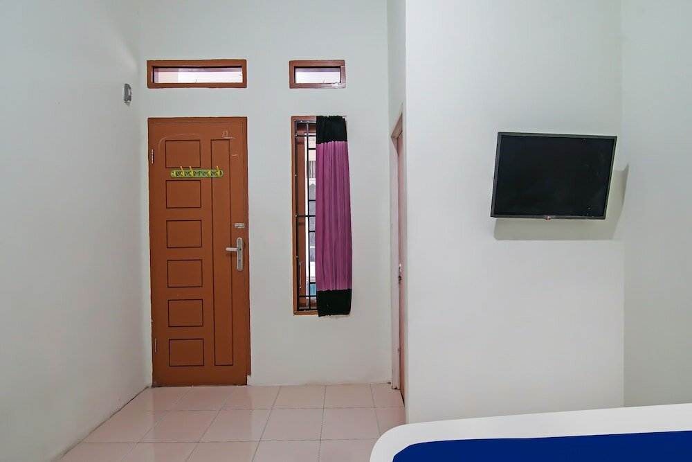 Фото Spot On 92093 Feri Homestay