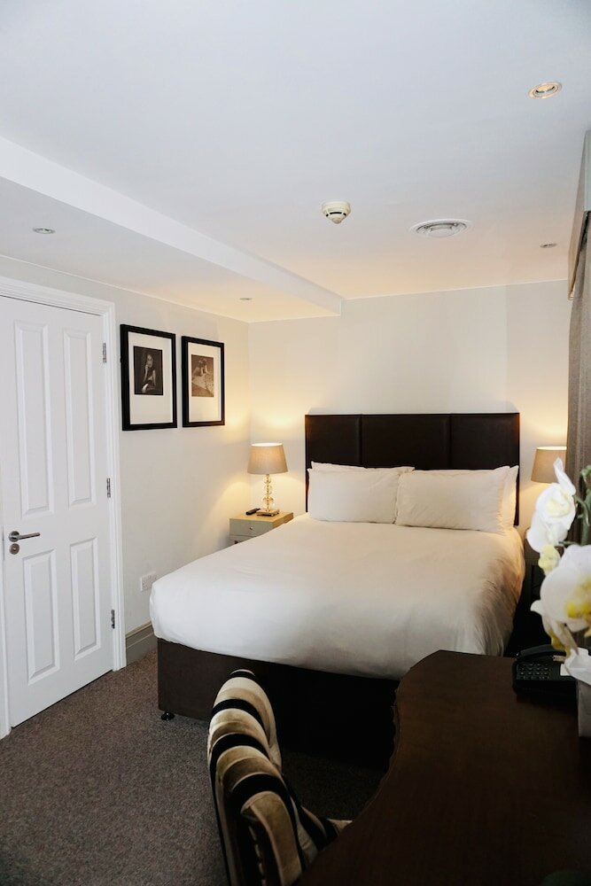 Фото Tophams Hotel