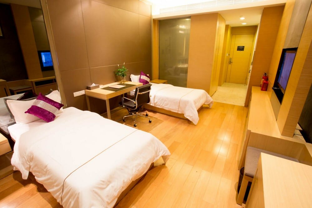 Фото Wanlong Apartment Pazhou Branch