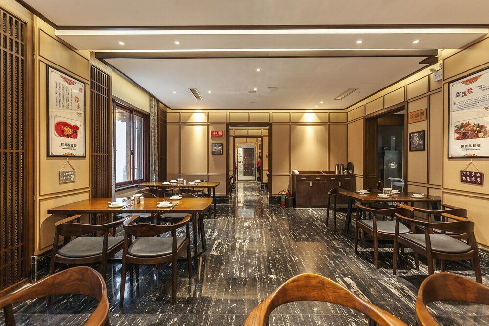 Фото Hejing Chengshang Generations Hotel