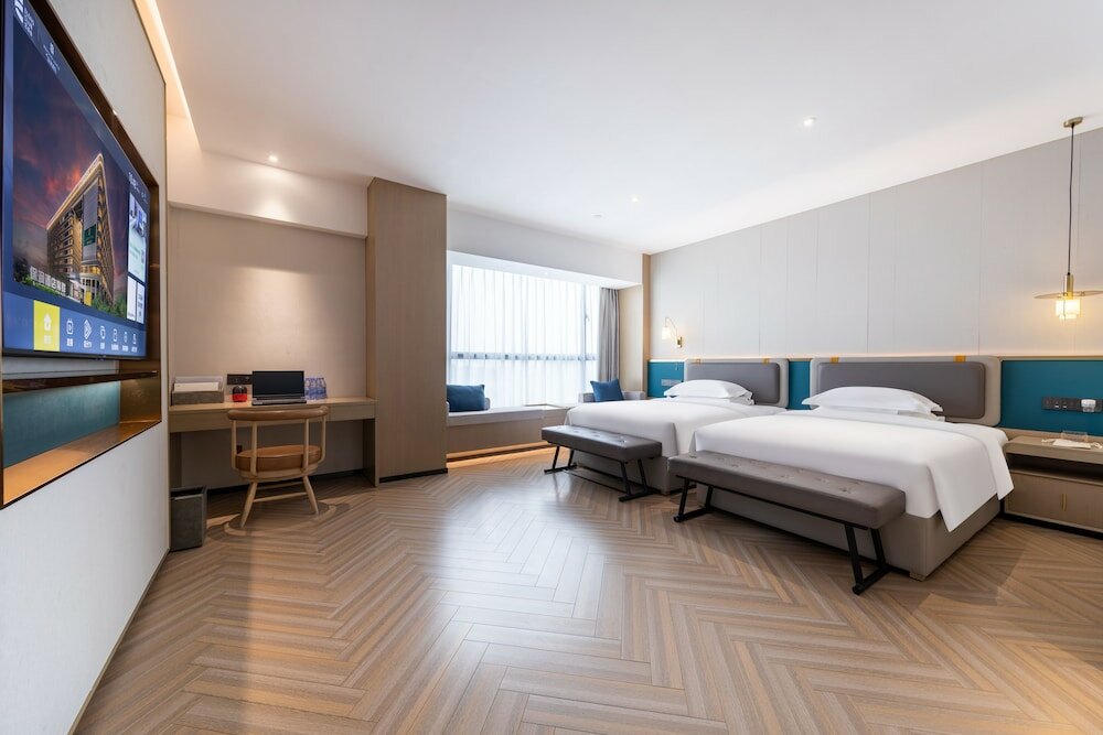 Фото Gz Baiyun Airport MeHood Liz Hotel T1