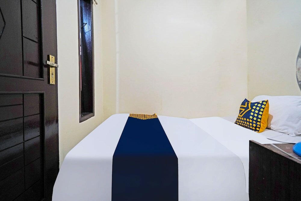 Фото Spot On 91783 Urban Syariah Residence