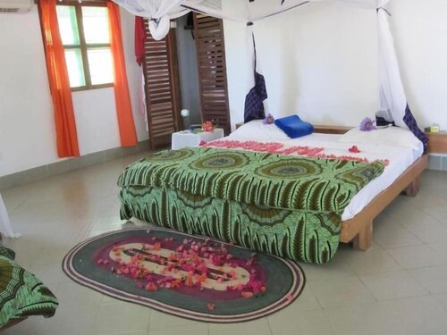 Гостиница Mike's Beach Cottages