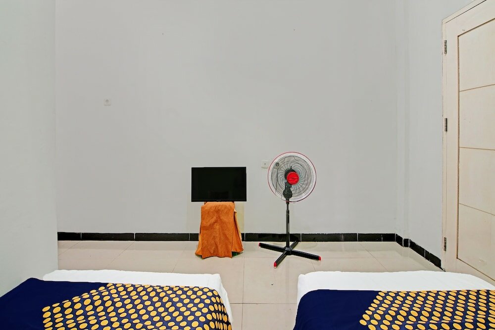 Фото Spot On 92536 Teguh Homestay Syariah