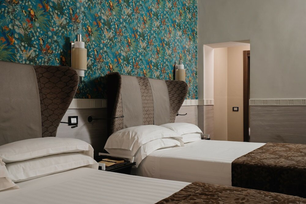 Фото Unica Suites Rome