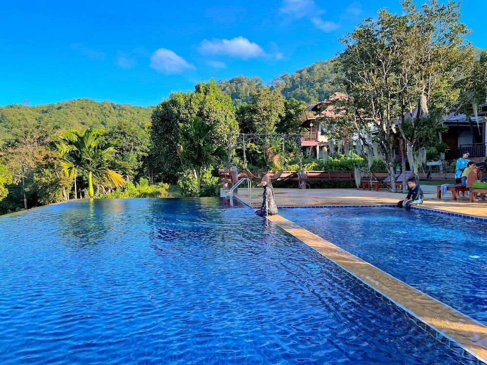 Фото Puteri Lanta Family Villas