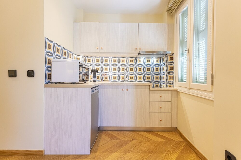 Фото Plaka Boutique Apartments