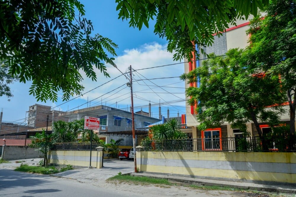 Фото RedDoorz near Millenium Waterpark Palu