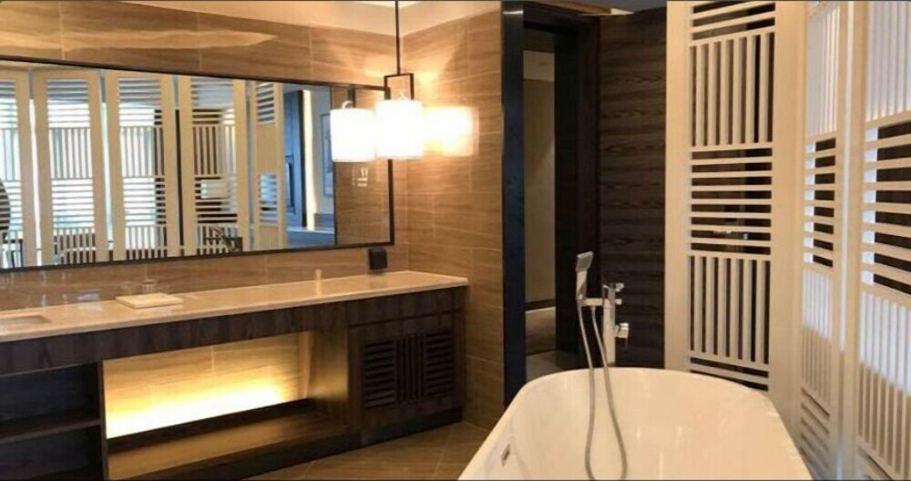 Фото Auden International Hotel