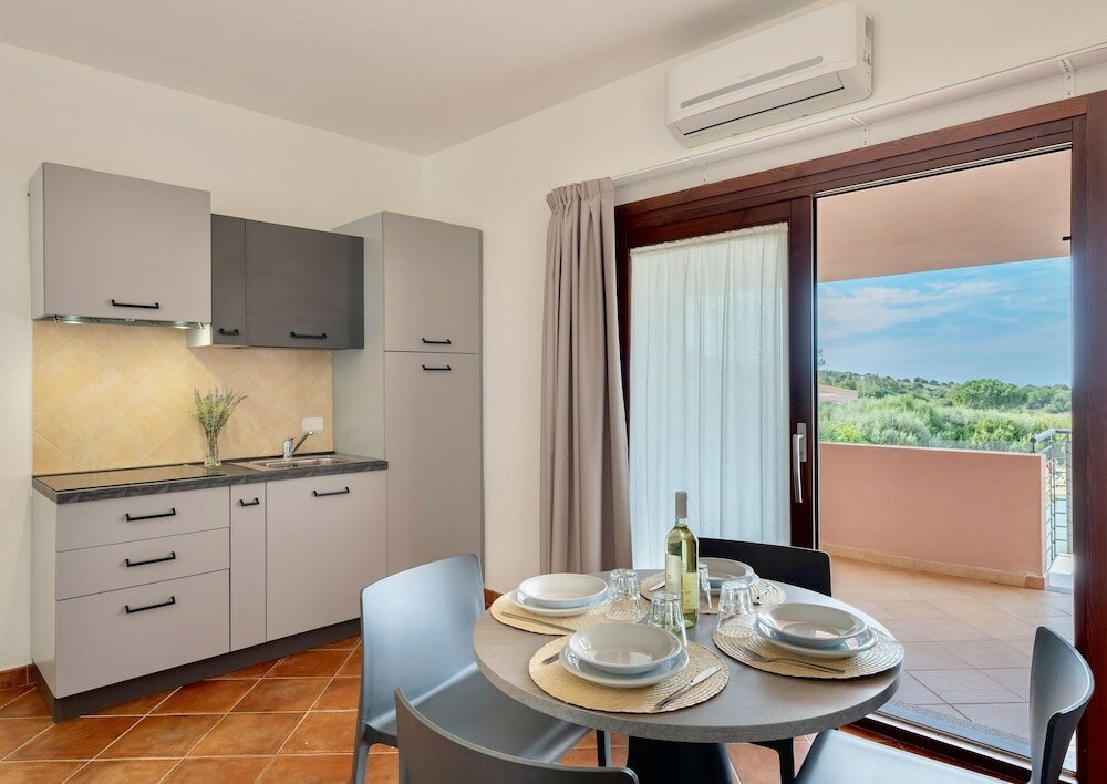 Фото Residence with pool in Isola Rossa