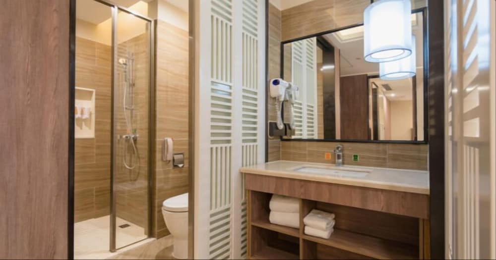 Фото Auden International Hotel