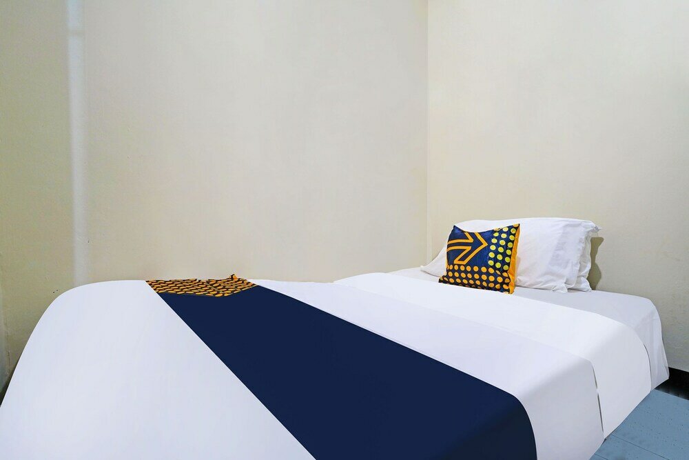 Фото Spot On 91783 Urban Syariah Residence