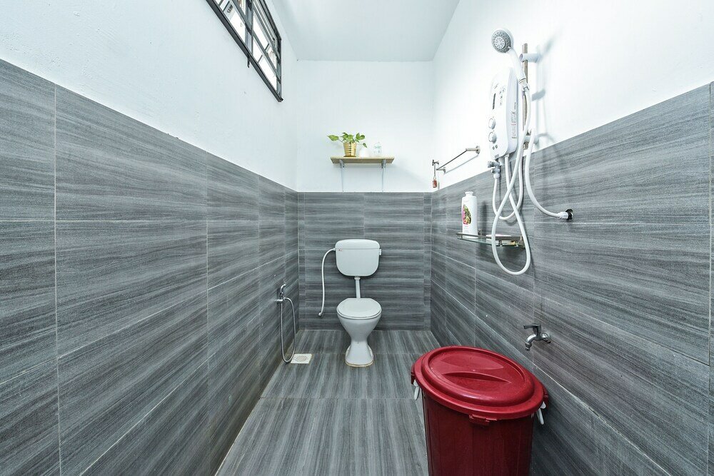 Фото Oyo Home 90682 Liliz Mambang Farmstay