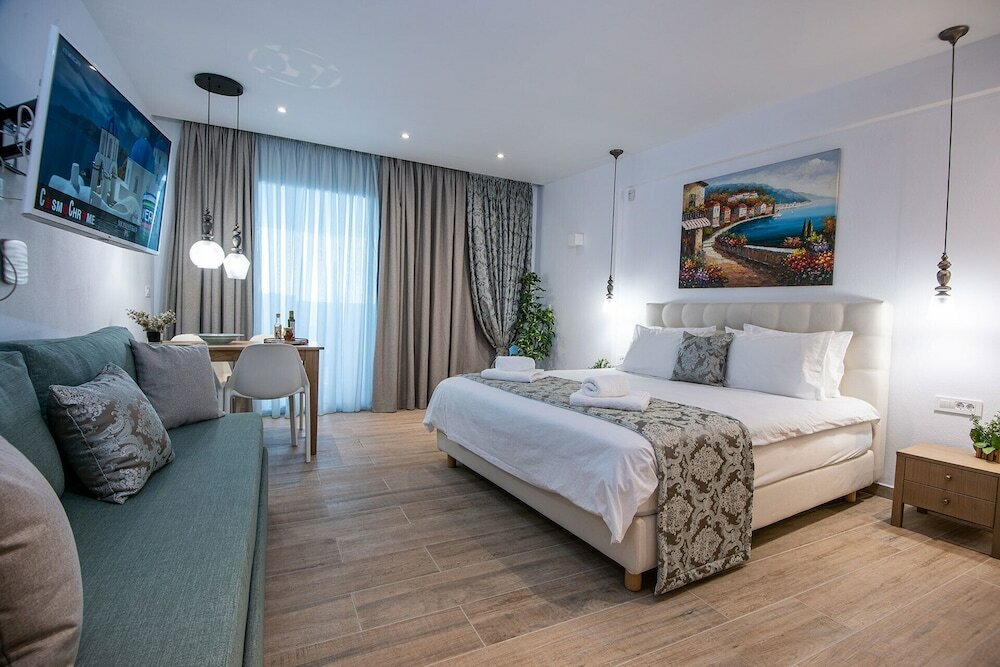 Фото Ammos Luxury Suites