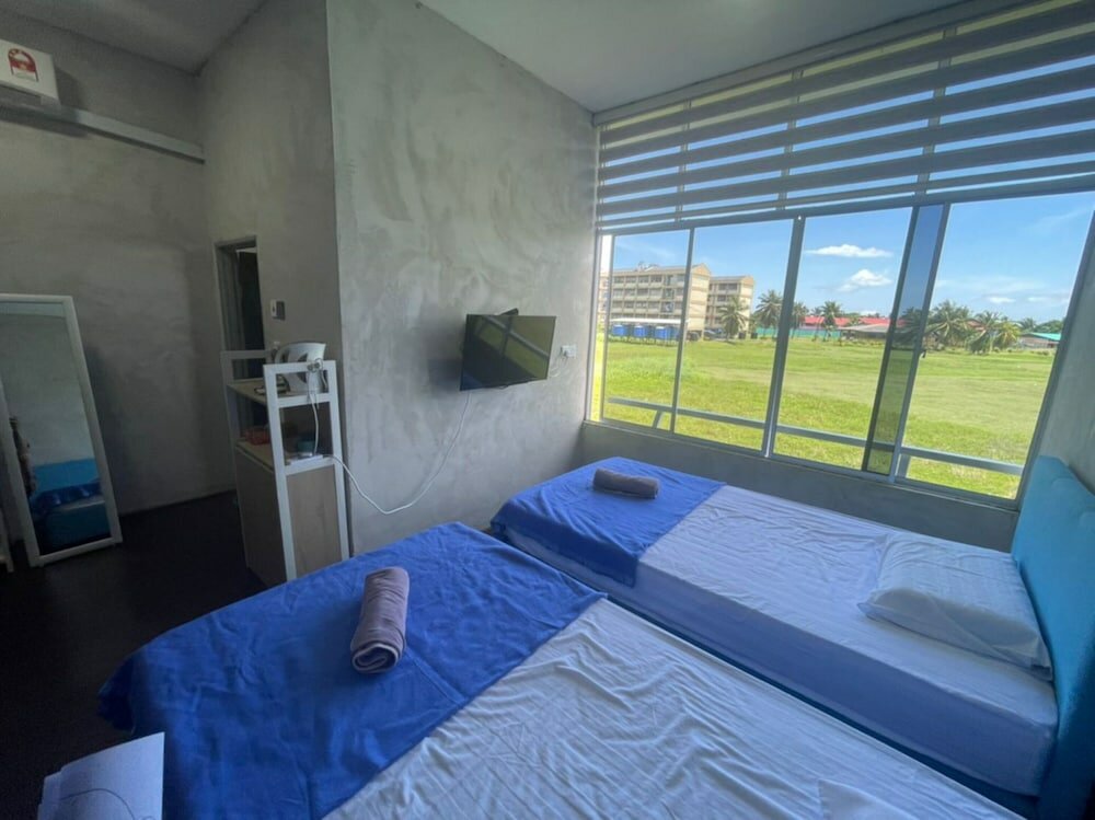 Фото Oyo Home 90370 D'tampi Homestay