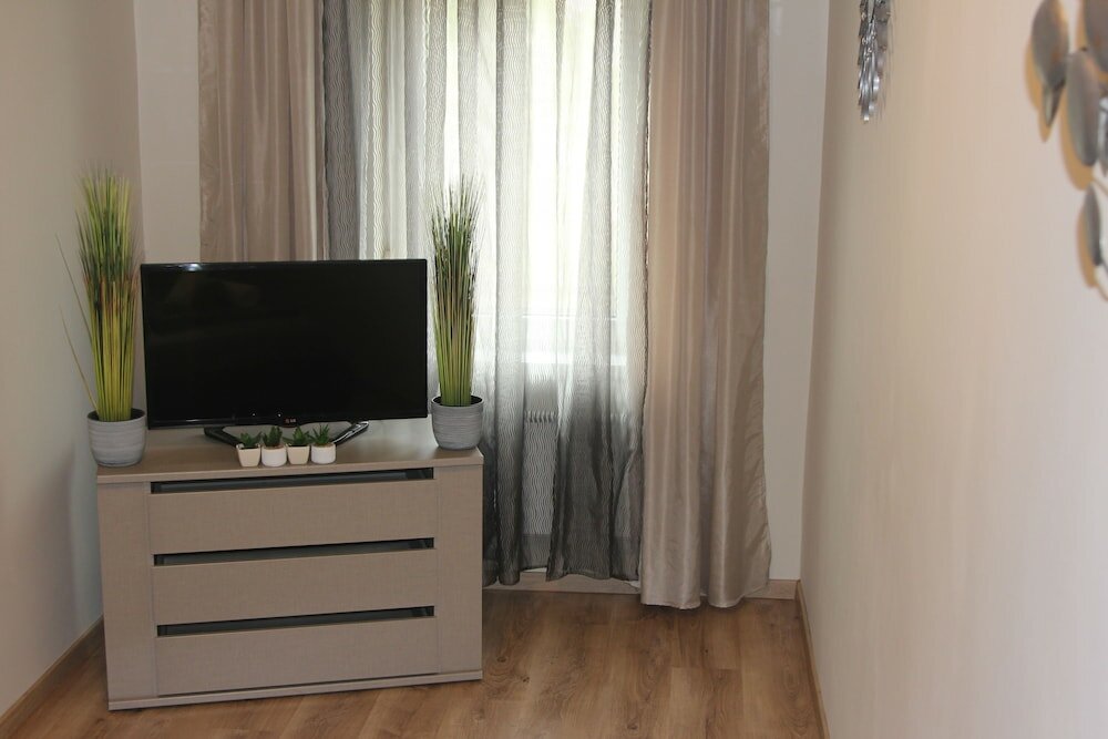 Фото Mox Downtown Apartman