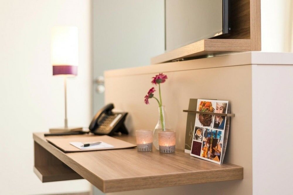 Фото Stratmanns Hotel