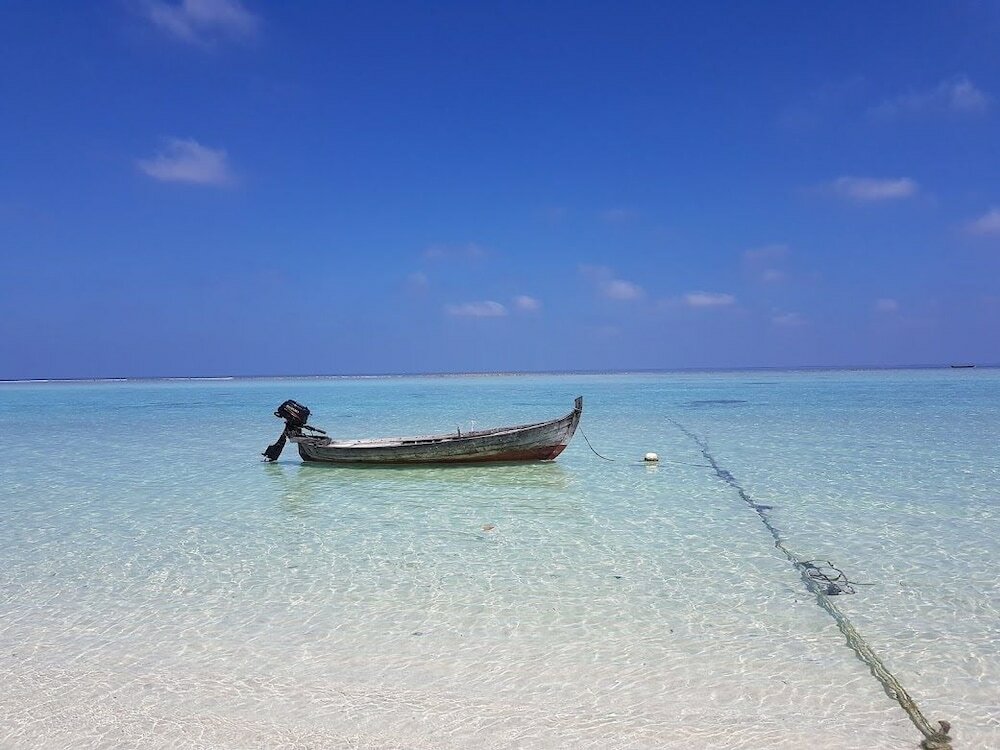 Фото Thoddoo Beach Holiday Inn