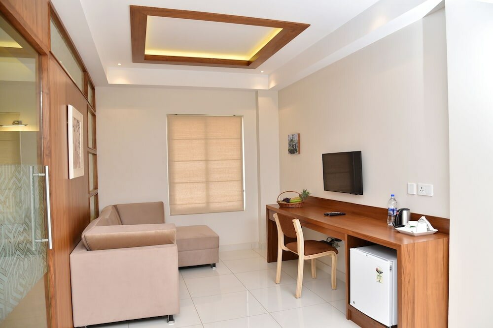 Фото Navaratna Inn A Luxury Hotel