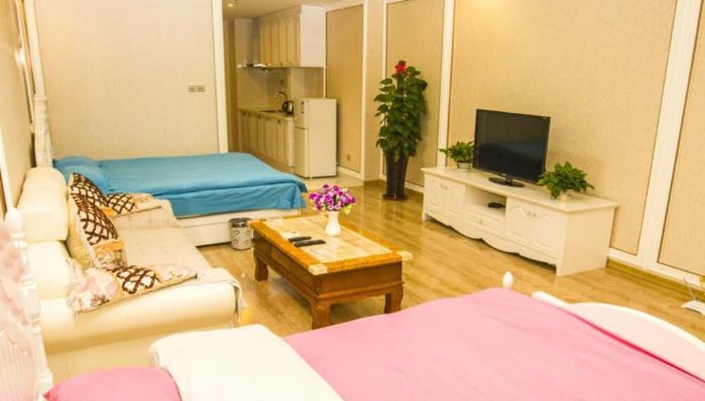 Hotel Guotai Ganghui Huiting Apartment, Dalian, photo