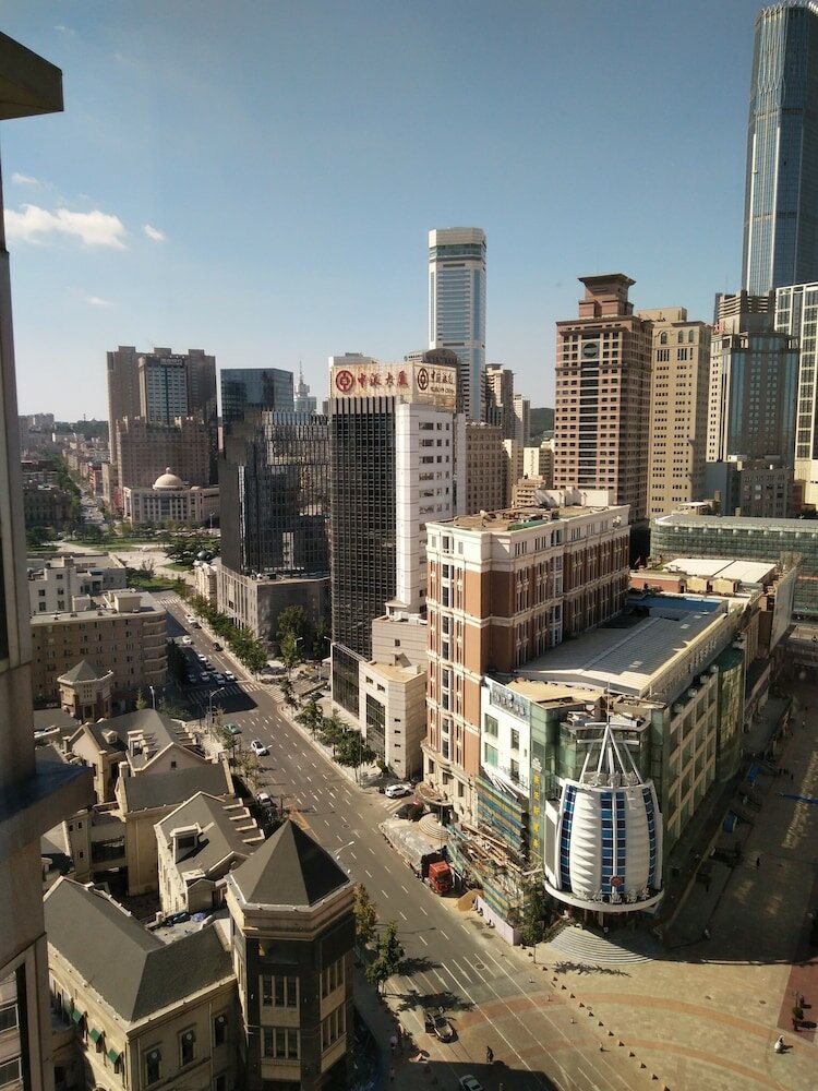 Фото Dalian Xiuzhu Building Apartment