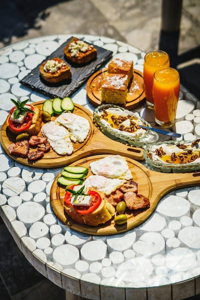 Фото Manias Hotel Apartments