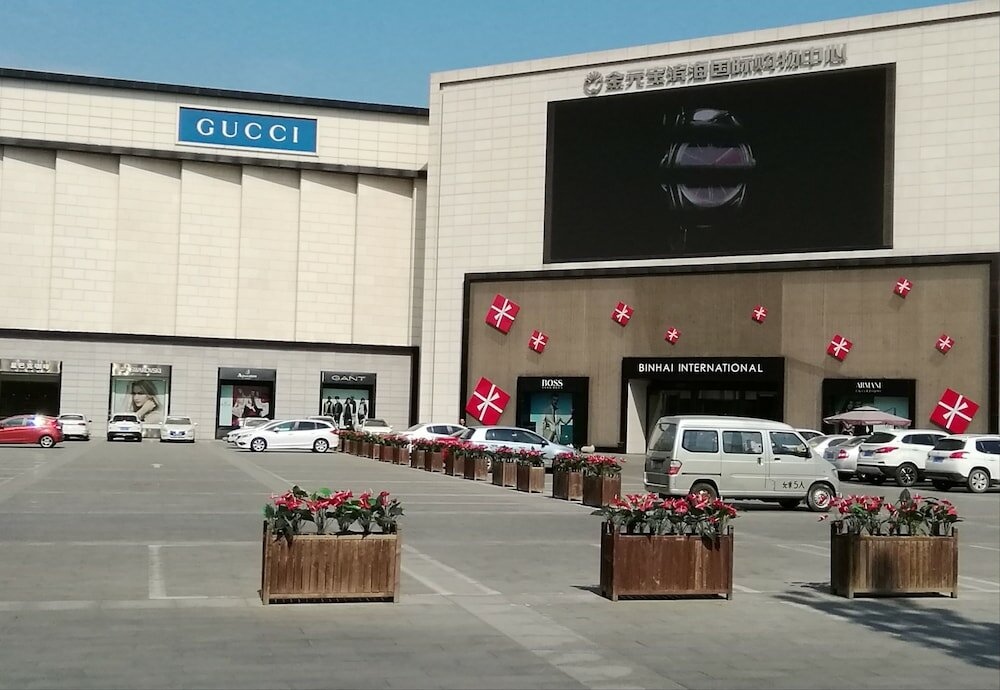 Фото Tianjin In-Zone Hotel