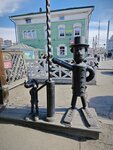 Человек с собачкой (3 July street, 31) ، نصب تذكاري، نحت