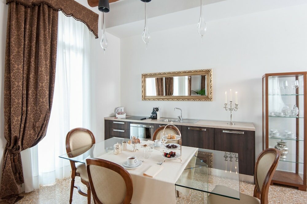 Фото San Teodoro Palace Luxury Apartments