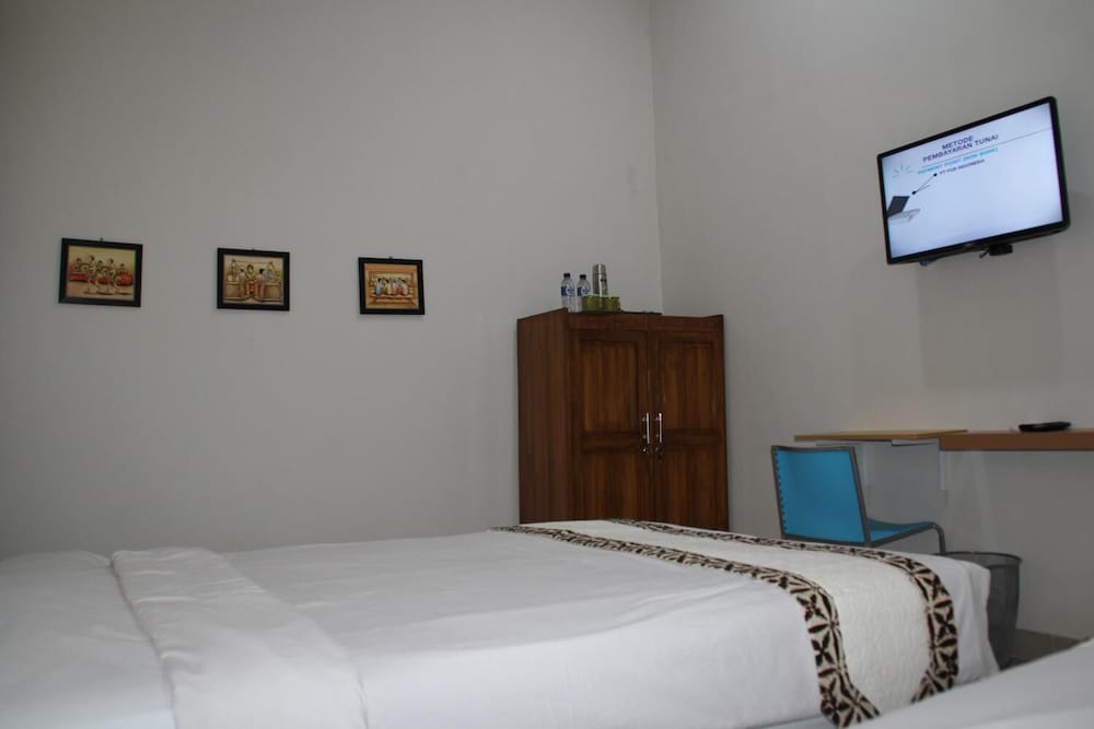 Фото Natura Rumah Singgah Guest House