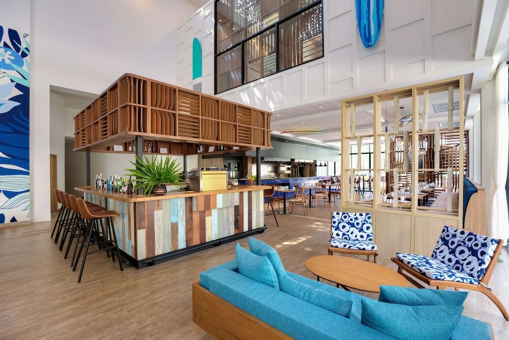 Фото Outrigger Surin Beach Resort