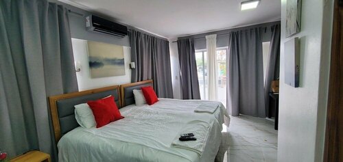 Отель Boca Grande Suites