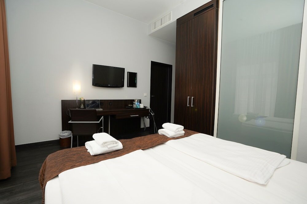 Фото The Atrium Hotel