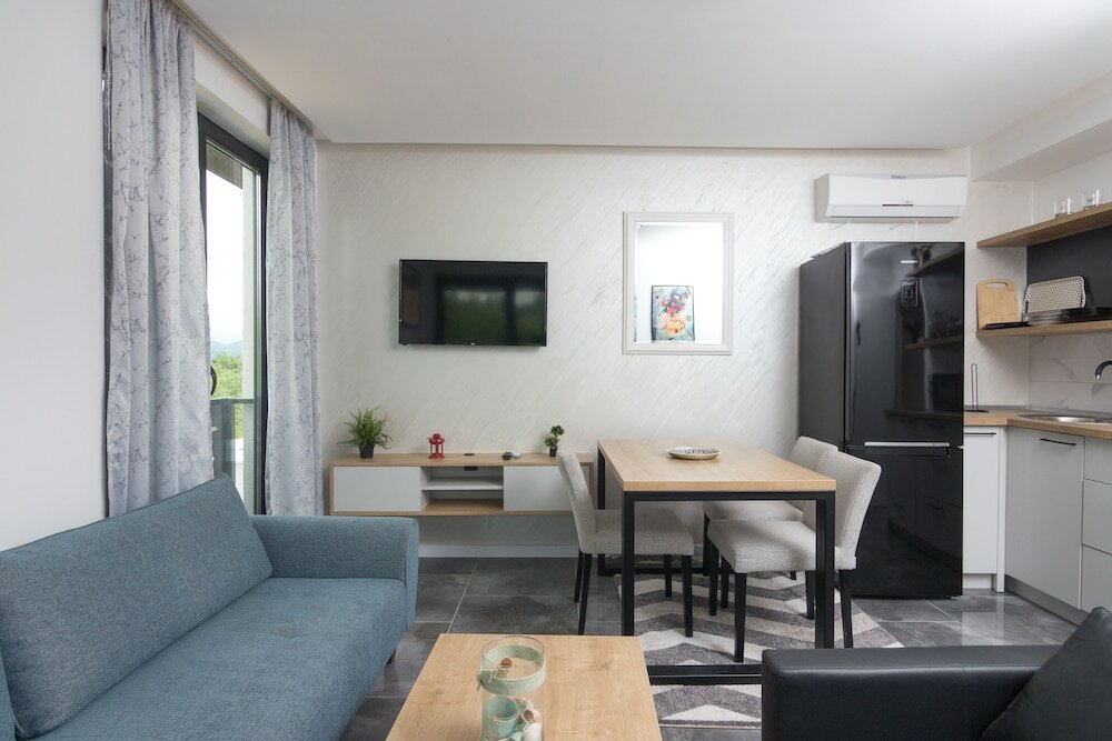 Фото Deluxe Feliciano Apartments